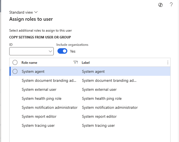 User role assignment interface showing options for various system roles including System agent, document branding administrator, external user, health ping role, notification administrator, report editor, and tracing user.